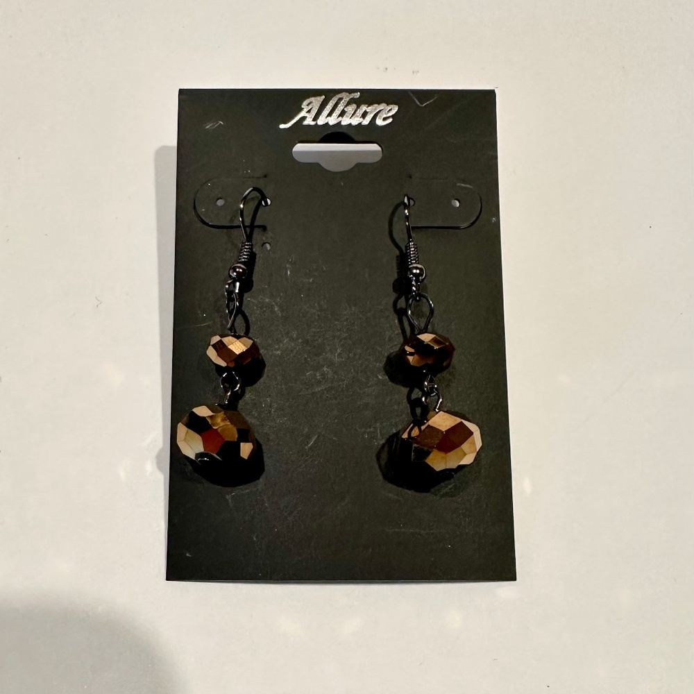 Allure Prism cut dangle earrings.